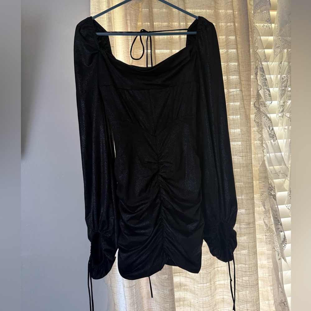 Lucy in the Sky Black Ruched Mini dress, with sleeves.
